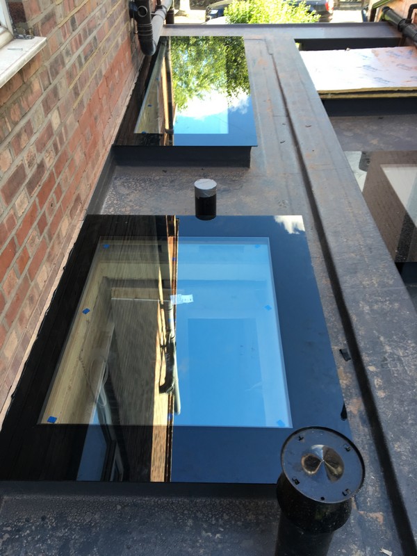Multiple flat roof skylights on extension in Paddington